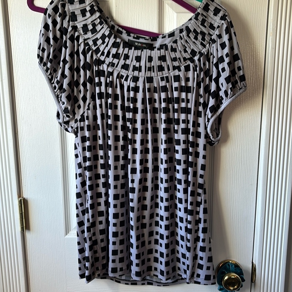 Grey and black blouse . No tags but never worn .
